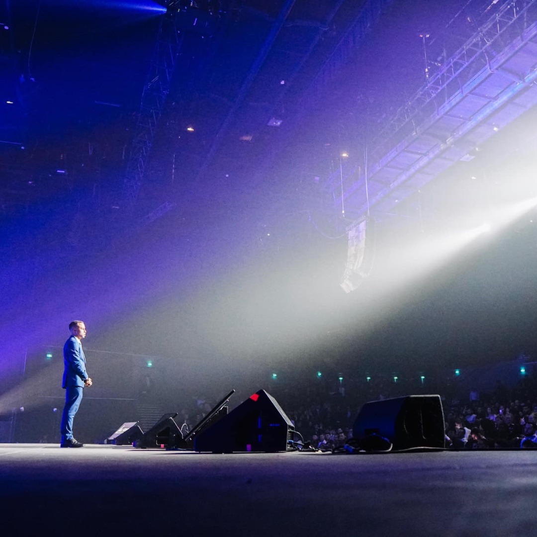 Samba Diagne on stage before a live audience